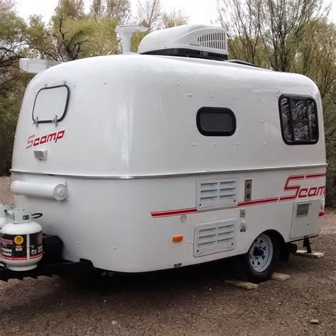 The good news though, is that when you opt for the more basic 13 Scamp trailer, you get a four-person sleeping capacity as opposed to just two, w hich is what is offered on. . Used scamp trailers